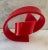 Bright and vibrant red contemporary curly lucite table top sculpture. Small (unknown) artist marking on inside edge.