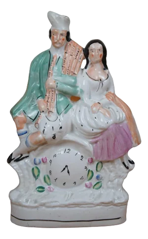 Antique Staffordshire Scottish Highland Couple Bag Pipes Clock Figurine