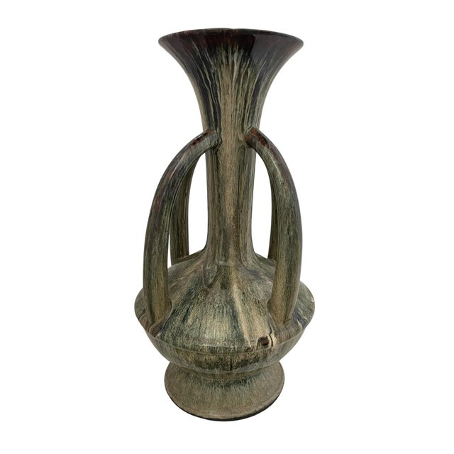 The Santorini 4 Handle Drip Glaze Vase in green is a contemporary, large ceramic vase with a unique drip glaze pattern....
