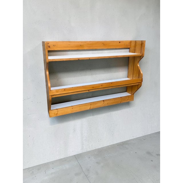 Original wall-mounted pine vaisselier designed for the interiors of the Les Arcs 1800 residences in the French Alps during...