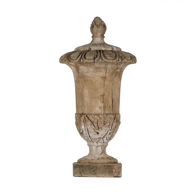 The Wooden Urn (Large) from Zentique is a poplar wood urn with a classical turned form. The 25" height creates a refined...