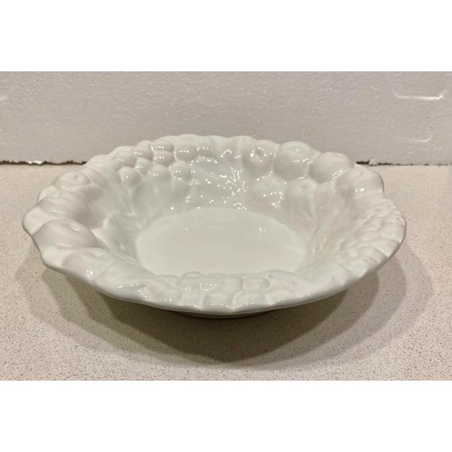 This is a heavy bowl embossed with fruit surrounding the rim. Made in Italy. Crisp white. Makes a nice centerpiece for...