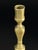 A finely proportioned Baroque brass candlestick dating to the first half of the 18th century, distinguished by its elegant...