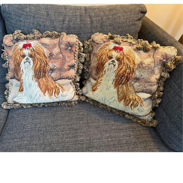 Two timeless, handcrafted needlepoint throw pillows with charming Shih Tzu portraits adorning the front. The pillows are...
