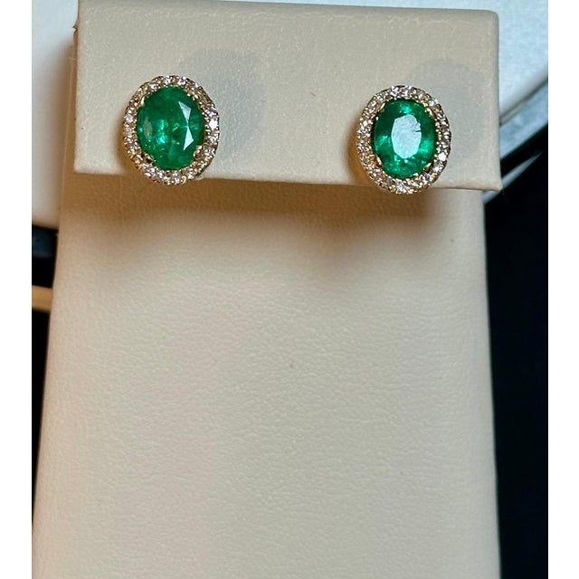 Emerald 6 Carat Oval Shape Emerald and Diamond Post Back Earrings 14 Karat Yellow Gold For Sale - Image 8 of 18