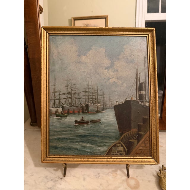 This is a wonderful antique maritime harbor painting, depicting a bustling working port filled with tall-masted sailing...
