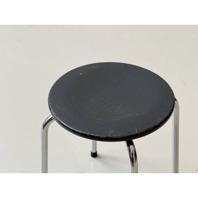 A functional stacking stool from switzerland with a clear, timeless design. The chrome-plated tubular steel frame with...
