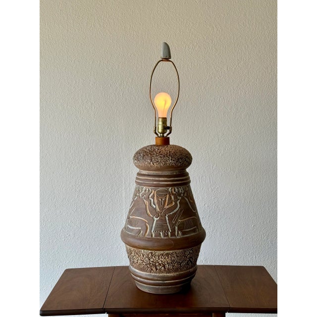 Lamp shade included! Fantastic large etched terra cotta lamp! Excellent condition, no cracks or chips. The finial is...