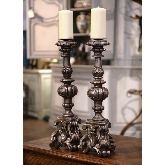 Add an air of drama and elegance to your interior with this striking pair of antique Italian candlesticks, crafted circa...