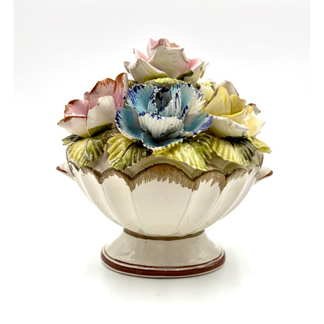 A beautiful vintage Italian hand painted porcelain flower topiary basket. Marked "Made Italy" on reverse. This lovely...