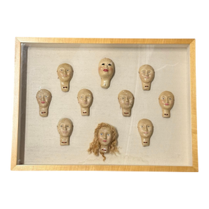 Framed Antique German Puppet Heads