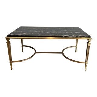 1940s Bronze coffee table with black Portor marble top in the style of Maison Jansen For Sale
