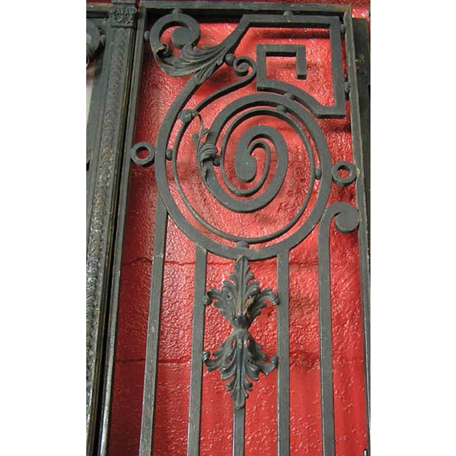 Antique, mid to late 19th century, French, Baron Haussmann style cast and wrought iron entry doors. This stately set of...