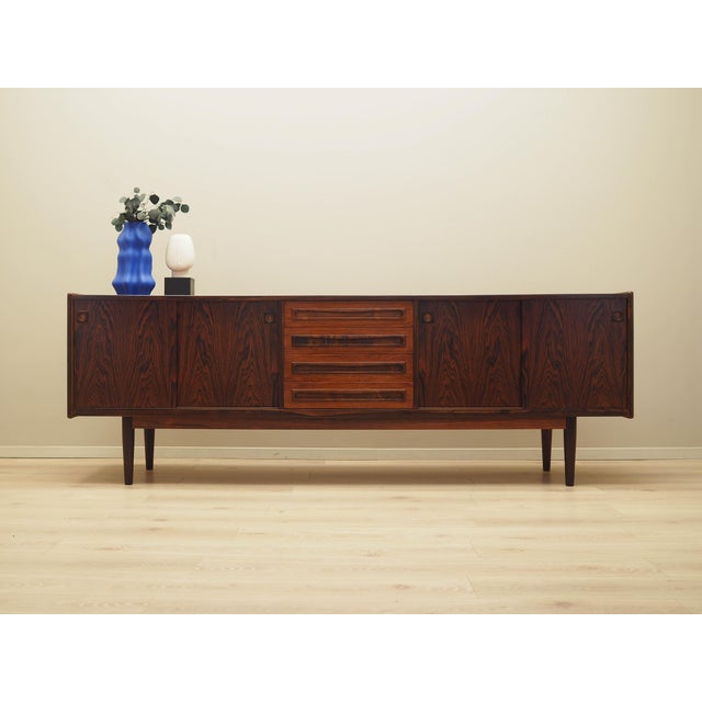 The sideboard was made in the 1960s, designed by leading Danish designer Johannes Andersen. Manufactured by the renowned...