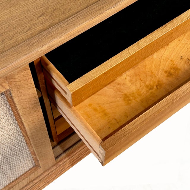 Unique & crafted vintage sideboard in solid oak, originally designed by Danish master, Henning Kjaernulf, circa 1960's....