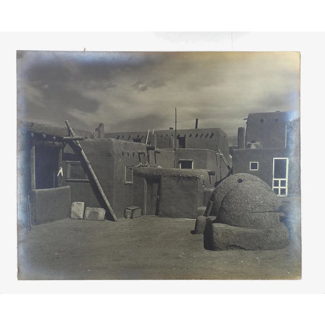 Mid century silver gelatin black and white photograph of an adobe village and ovens. Unsigned. Unframed, mounted on...