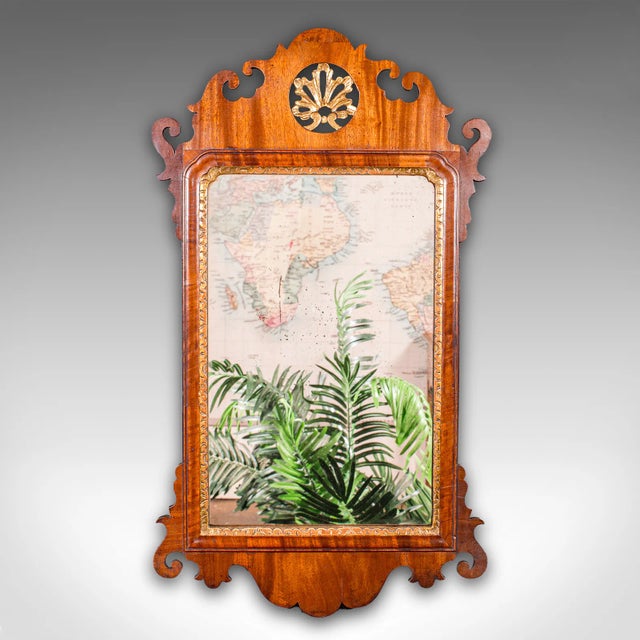 This is an antique vanity mirror. An English, mahogany and glass hall, bedroom or morning room mirror, dating to the...