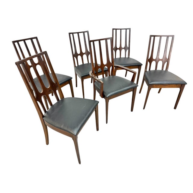 Elevate your dining space with this striking set of six Mid-Century Modern Broyhill Brasilia dining chairs, celebrated for...