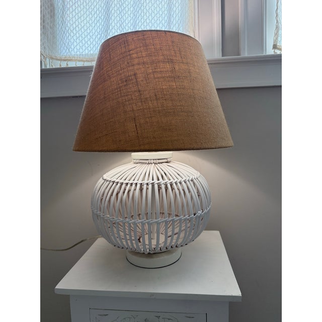 Bring effortless coastal elegance to any space with this substantial Ralph Lauren table lamp featuring a sculptural white...