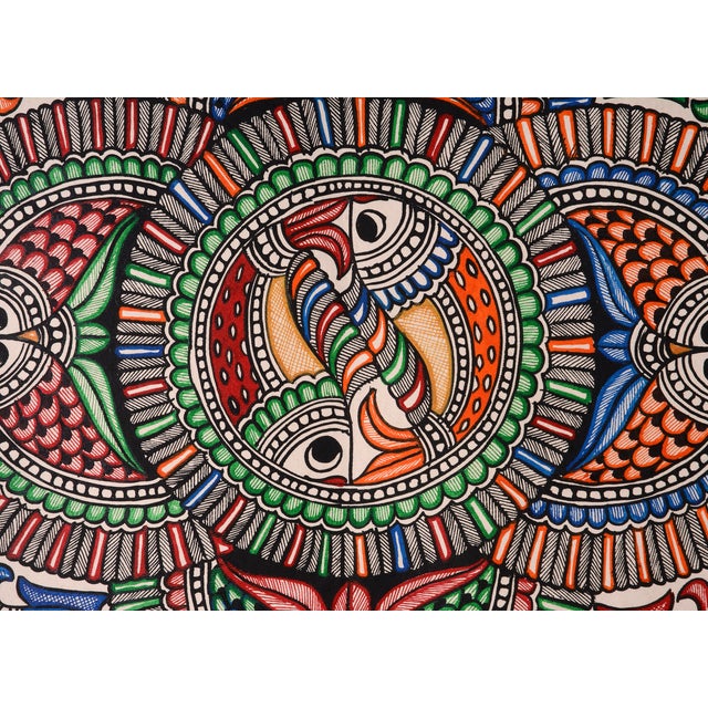 Celebrate the beauty of traditional Indian folk art with this exquisite hand-painted Madhubani painting by Mamta Devi, a...