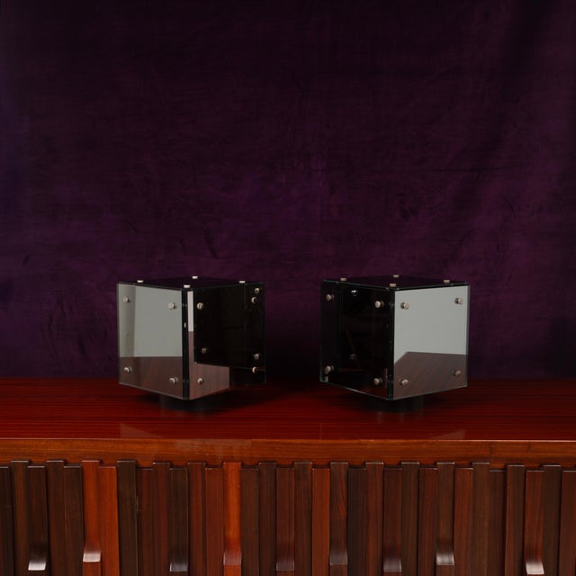 A striking pair of prisma table lamps designed by studio a.r.d.i.t.i. And produced by sormani in 1970, characterized by a...