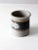 This vintage studio pottery cachepot features a speckled stoneware surface with a blue-gray glazed band framed by earthy...