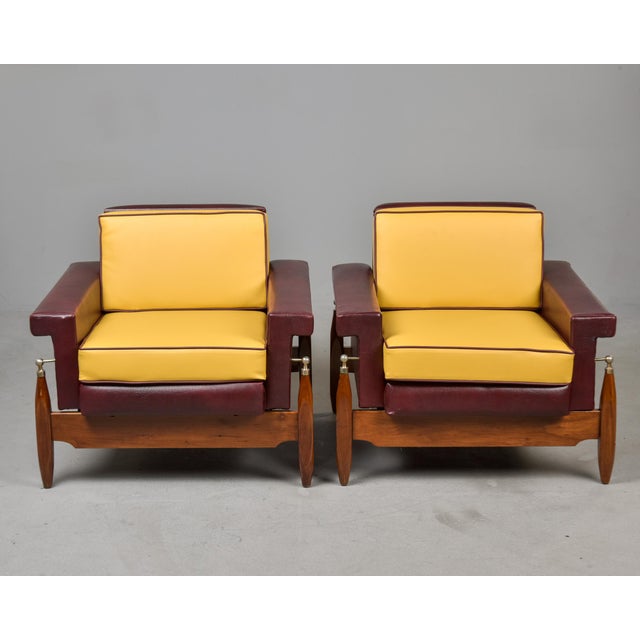 Found in Italy, this pair of armchairs attributed to Luigi Gigi Radice dates from the 1950s. Walnut and metal frames with...