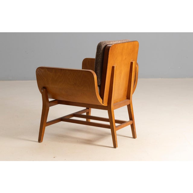 This set of four armchairs originates from France and dates to the 1970s. The chairs were used in a hotel in Chamonix,...