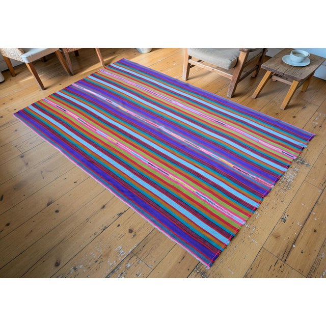 Woven on a traditional village family loom in Southeastern Anatolia during the 1960s, this beautiful flatweave kilim was...