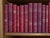 LOT OF 40 VINTAGE LEATHER BOUND BOOKS IN FRENCH WITH DECORATIVE RED BINDINGS These world literature books are in French;...