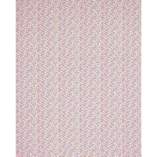 "Happy Menocal’s microfloral fabric offers a fresh take on a traditional calico. With its charming, stylized flowers...