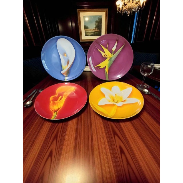 This vintage set of 4 Givenchy Paris luncheon dessert salad flower plates is a colorful and elegant addition to any dining...