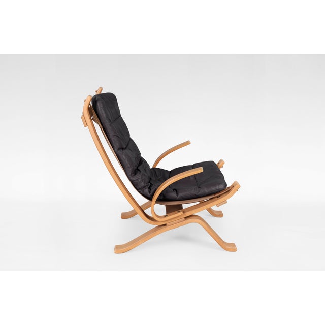 Original Focus sling lounge chair, designed in the 1970s and manufactured by Bramin Møbler in Denmark. Bent plywood frame...