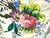 A vibrant set of six vintage hand painted ceramic dessert plates featuring lively floral bouquets in saturated hues of...