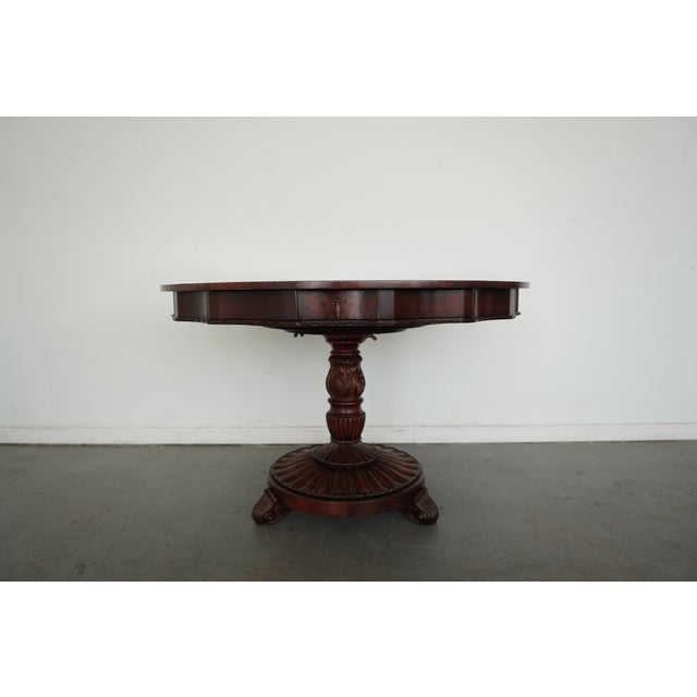 A fine round mahogany center table by Jonathan Charles Fine Furniture, showcasing the brand’s renowned dedication to...