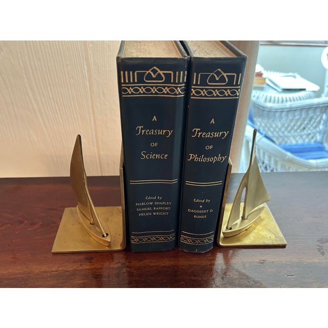 Pair solid brass mid century sailboat bookends. 5" tall, 3.25" wide.