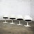 Awesome Mid-20th Century Mid Century Modern Tulip Swivel No. 116 Armchairs by Burke comprised of a white fiberglass armed...