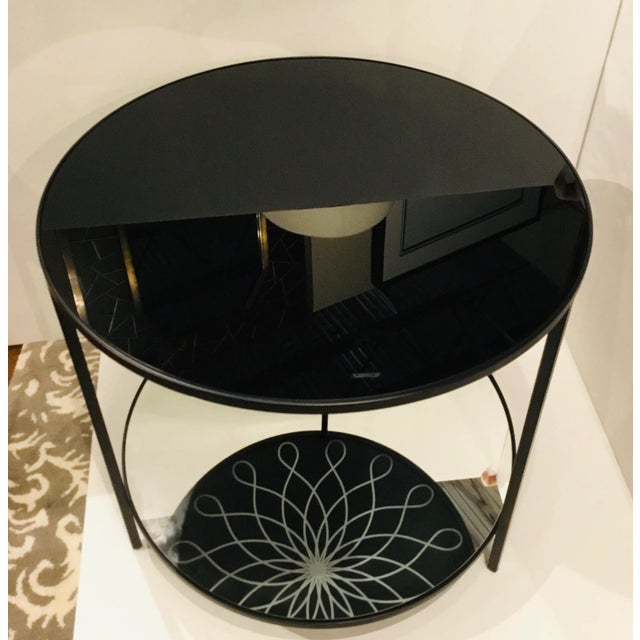 Elegant Caracole Modern reflective end table, black metal frame, smokey mirror top and regular mirror lower shelf that...