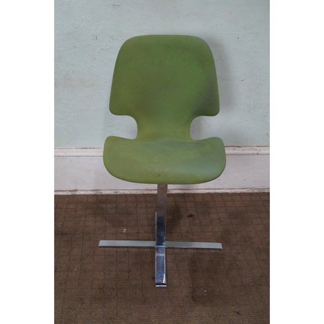 Mid-century chrome pedestal office side chair in the style of Arne Jacobsen for Fritz Hansen. Upholstered over molded...