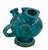 This striking glazed terracotta jar/vase combines a brutalist silhouette with a vibrant cerulean or turquoise blue hue....