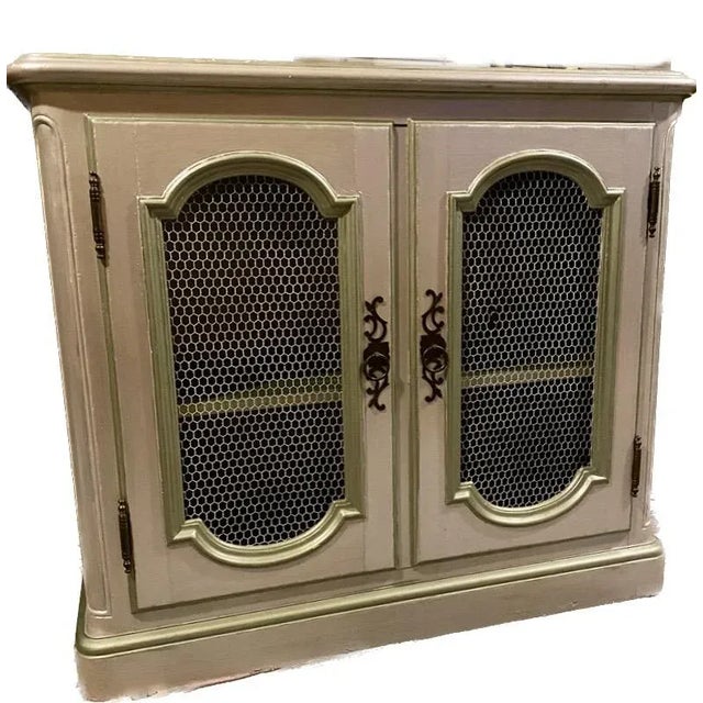 Unsigned Baker cabinet with custom pearlized paint. This cabinet came to me in this condition. It looks like it might have...