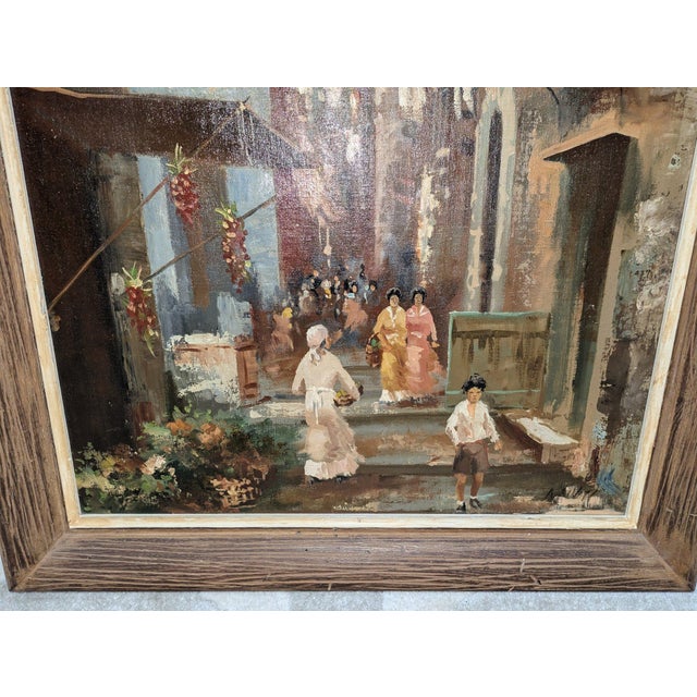 Vintage mid-century European street scene oil painting on canvas, beautifully framed and attributed to Antonio DeVity....
