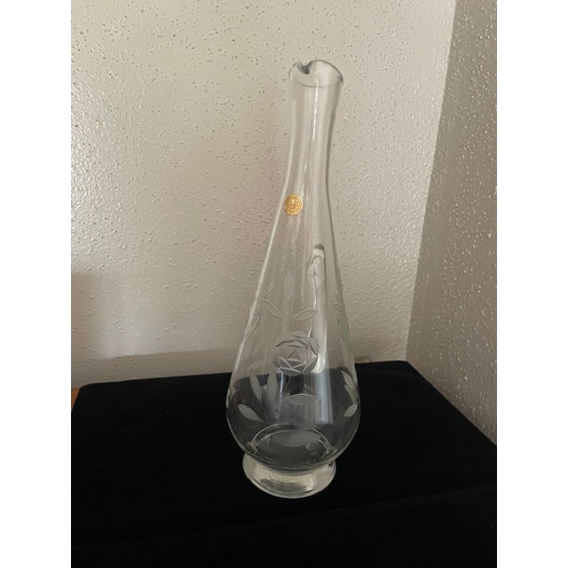Vintage Roumanian etched glass wine decanter (no stopper). This decanter has an etched floral design and in excellent...