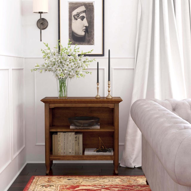 This stylish bookcase is a wonderful accent in a living room, family room, hallway or home office. Made for smaller...