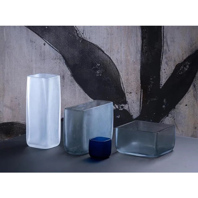 Designed by LPWK, Cubes is a collection comprising bowls, minicontainers and a vase made of frosted Murano glass, in which...