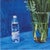 David Hockney Iris with Evian Bottle Poster (1998), 2004 Dimension: 33.1 × 23.4 in | 84.1 × 59.4 cm (A1) Accompanied by a...