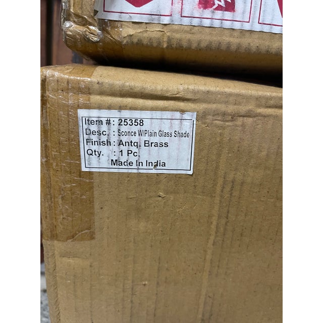 Beautiful brass and glass sconces by Barbara Cosgrove, two available. Thick and hefty glass shade makes a gorgeous...