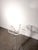 Striking vintage pedestal crafted entirely from clear acrylic glass, featuring a sculptural geometric construction with...