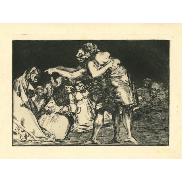 Disparate matrimonial - from Los Proverbios is an original black and white etching realized by Francisco Goya (1746-1828)....