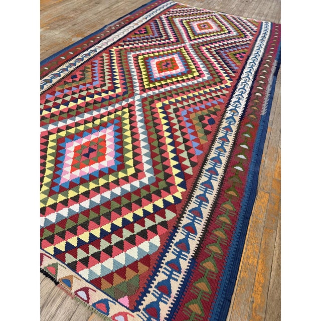 "This is a striking and highly authentic room-sized antique Turkish Village Kilim, cataloged. Dating back to circa 1940,...